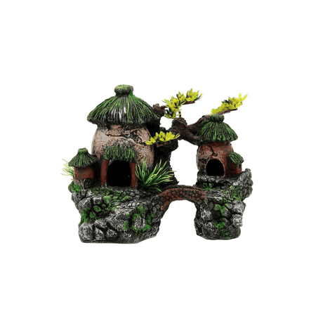 Decorative aquarium scene with lush green plants, colorful fish, a small bridge, and natural rock formations creating a peaceful aquatic landscape.