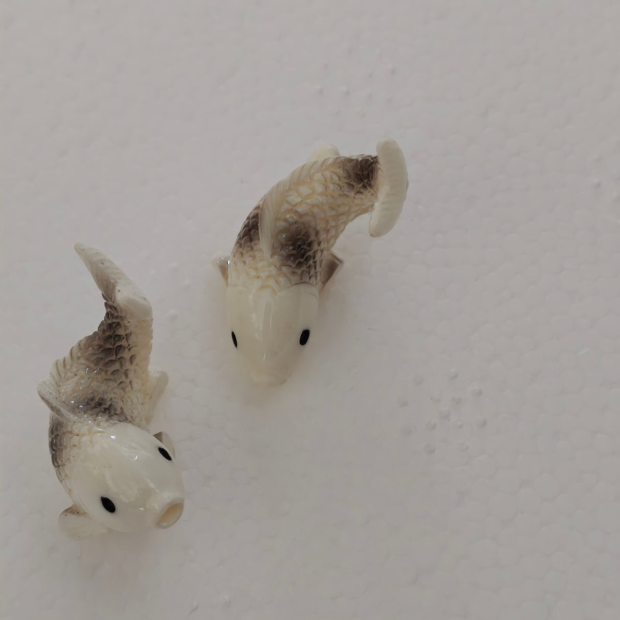 Small White With Black Fish Toy