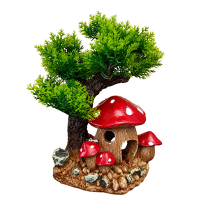 Decorative miniature tree with red mushrooms on a white background