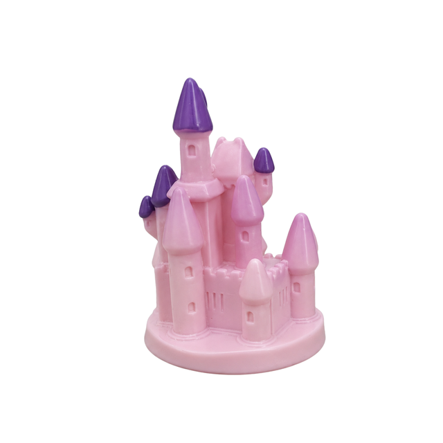 Pink toy castle with purple spires on a white background